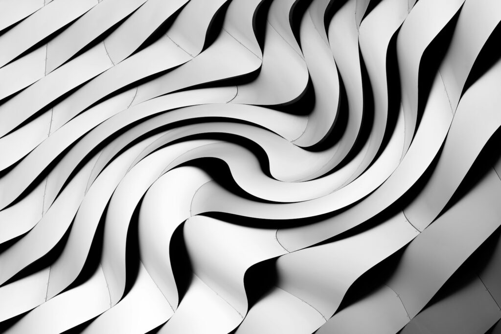 a black and white photo of a wavy pattern